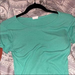This is a crop top from Tillys. It is a medium. Very soft material.